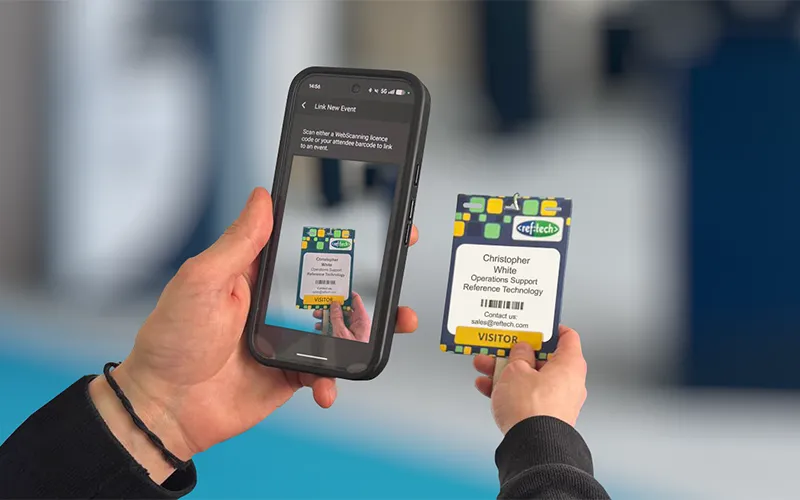 A person scanning their badge to login to the ContactScanning app.