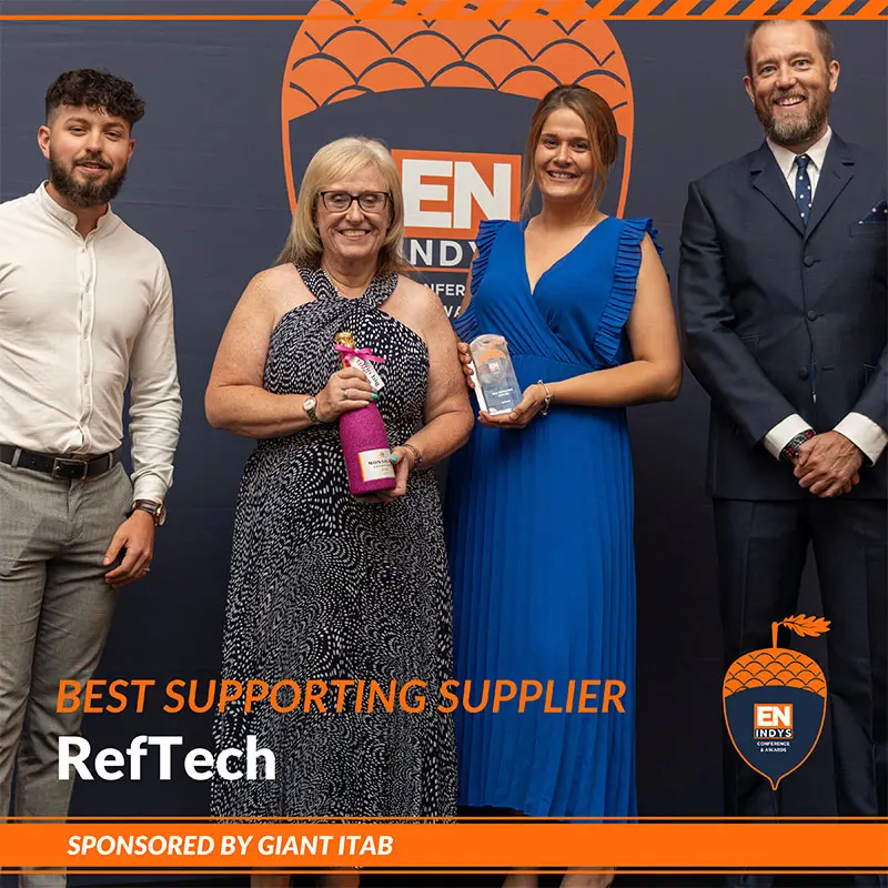 Collecting the award on stage