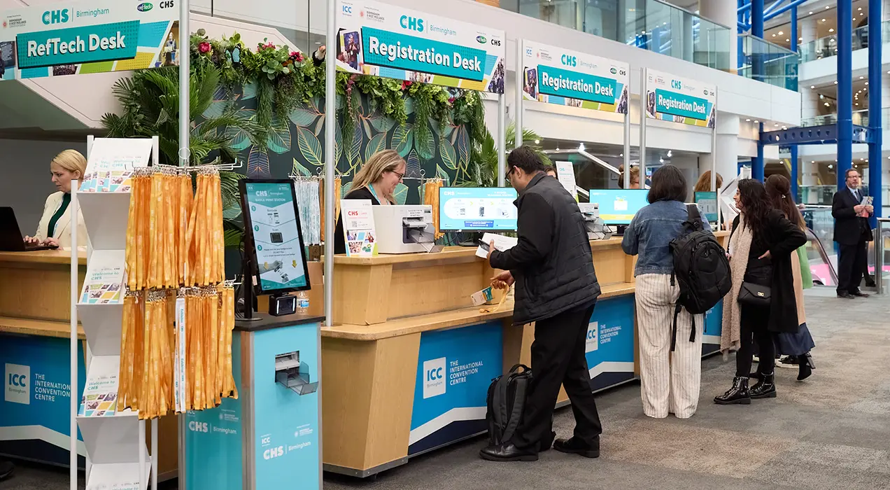 Registration site displayed on laptop and phone