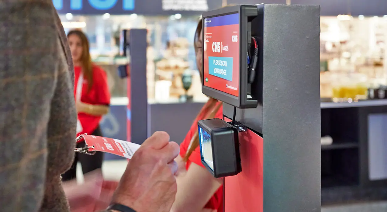 Exhibition with badging stations