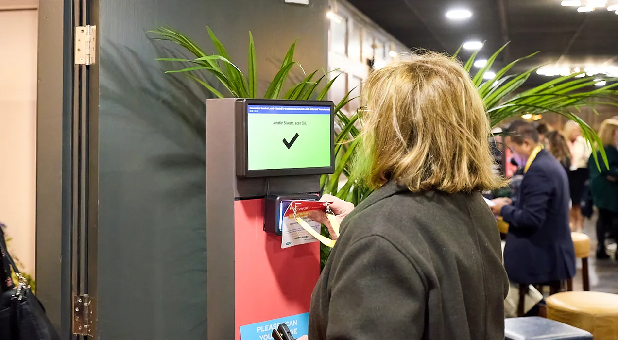 Man scanning his badge at a ScanPod